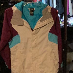 Girl’s North Face jacket size 14/16 multi colors with hoodie